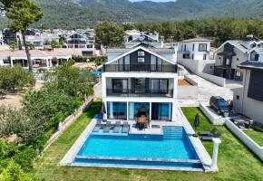 Fethiye Ölüdeniz'de Babadağ'ın Eteklerinde Nem ve Bunaltıcı Havadan Uzakta Kiralık Villa Pandora G