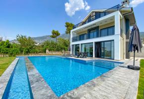 Fethiye Ölüdeniz'de Babadağ'ın Eteklerinde Nem ve Bunaltıcı Havadan Uzakta Kiralık Villa Pandora G