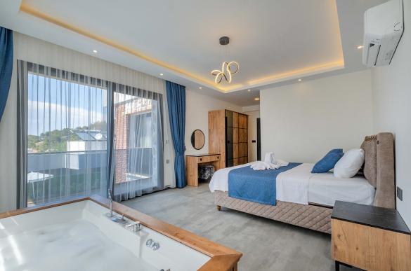 fethiye-faralyada-deniz-manzarali-jakuzili-villa-11_106.jpg